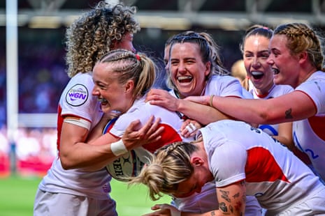 Millie David (second left) is congratulated by her teammates after scoring England’s second try.
