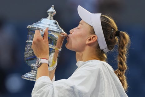 Elena Rybakina of Kazakhstan kisses the trophy