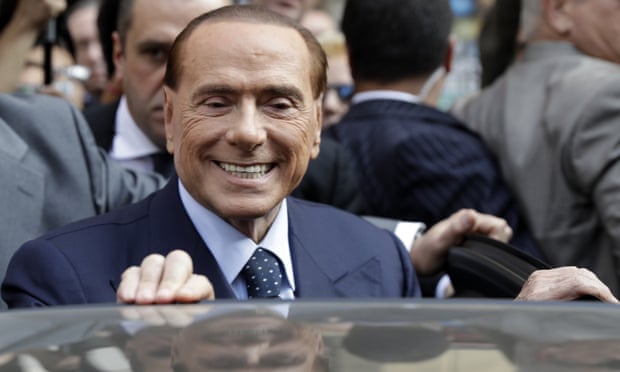 Berlusconi getting into a car