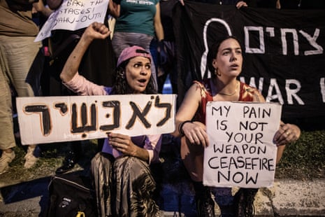 Israeli protesters stage a demonstration demanding an end of Israeli army’s attacks on Gaza and prisoner exchange in Tel Aviv, Israel on November 11, 2023.
