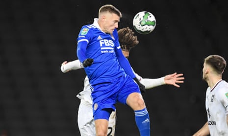 Leicester City’s Jamie Vardy heads home the Foxes’ third goal.