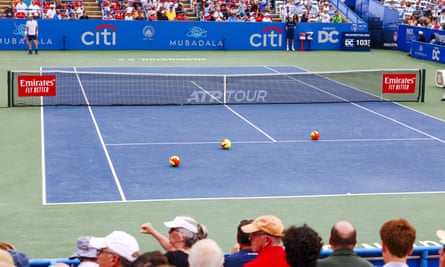 Climate Defiance, a local climate activist group in DC, chanted and threw oversized balls on to the court.