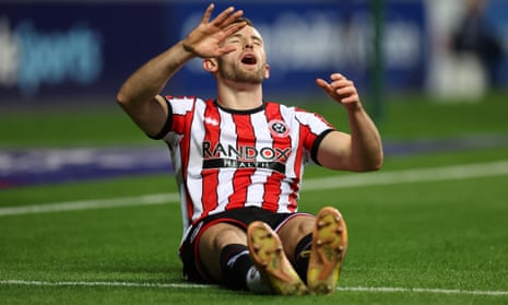 Sheffield United’s Rhys Norrington-Davies lies injured during last week’s game at Coventry.