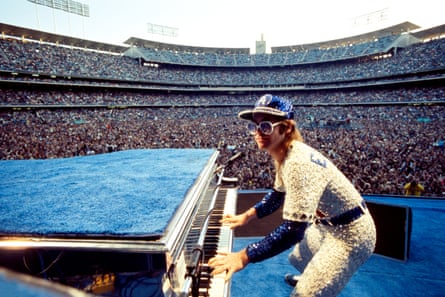 English singer and songwriter Elton John performs at Dodger Stadium in Los Angeles, October 1975.