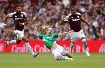 Aston Villa’s Ezri Konsa fouls Newcastle’s Anthony Gordon