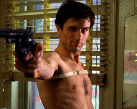 Man with gun looking tough and handsome
