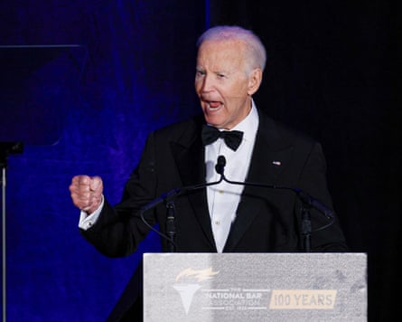 Joe Biden at the lectern at an awards gala.