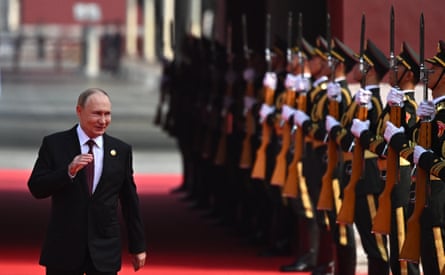 Vladimir Putin arrives before the military parade.