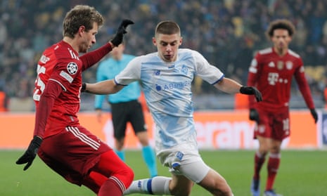 Dynamo Kyiv’s Vitaliy Mykolenko (centre) tries to deal with the threat of Bayern Munich’s Thomas Müller during last month’s Champions League game in Ukraine.