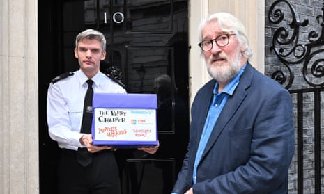 Jeremy Paxman handing in the Parky Charter petition at No 10.