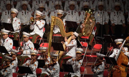 Performers at a concert in Pyongyang. At such events in North Korea performers normally play in front of a giant screen displaying the country’s successes.