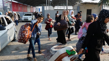 Rafah border crossing opens for limited evacuations of foreign nationals – video