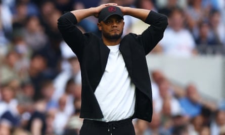 Vincent Kompany puts his hands on his head.