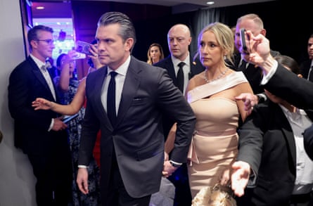 Man holds woman’s hand