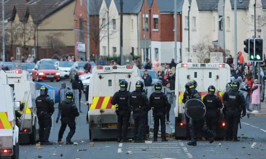 Police in riot gear during loyalist protests in Belfast in April 2021.