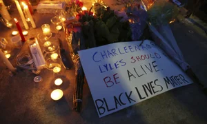 A vigil for Charleena Lyles, who was shot and killed Sunday.