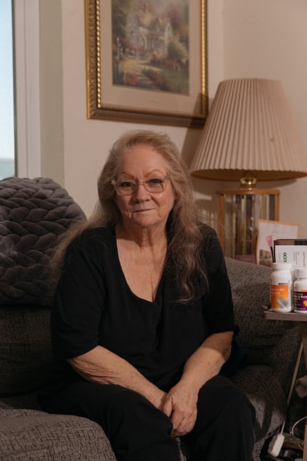 a woman sits on a couch
