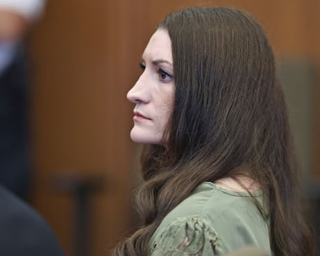 Lindsay Clancy, in a green top, looks on as jurors reenter the courtroom