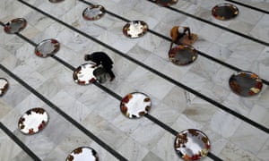 Boys prepare food for devout Muslims to break their day-long fast on the last Friday of the holy month of Ramadan in Mumbai, India.