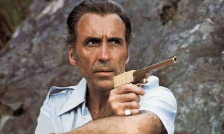 Christopher Lee as Scaramanga in The Man With the Golden Gun (1974). Peter Lamont commissioned the gun prop and taught Lee how to assemble it.