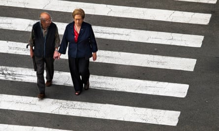 old couple cross the road