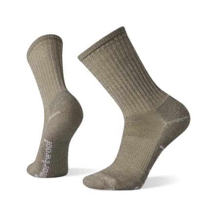 A pair of taupe coloured Smartwool cushion crew socks.