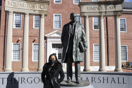 Maryland state delegate Vanessa Atterbeary stands by a statue of former supreme court justice Thurgood Marshall in Annapolis, Maryland.