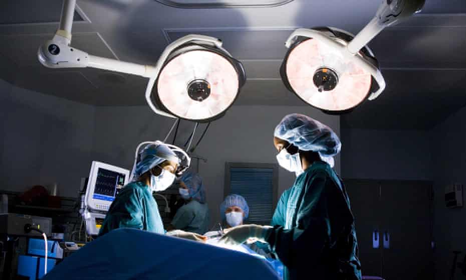 Doctor and nurse during surgery