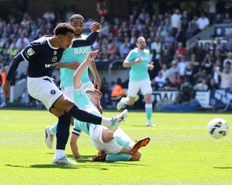 Millwall’s Femi Azeez scores against Oxford United at The Den