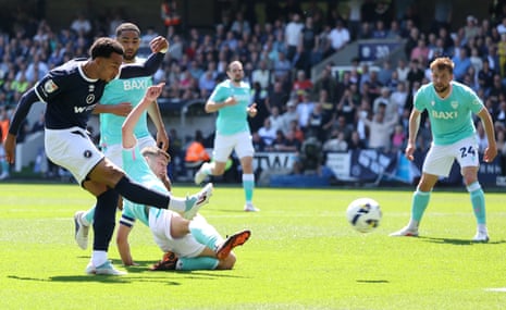 Millwall’s Femi Azeez scores against Oxford United at The Den