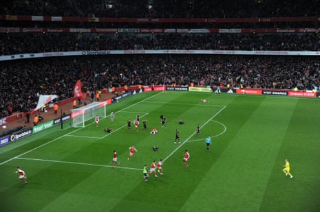 Arsenal’s players celebrate their 97th-minute winner against Bournemouth, scored by Reiss Nelson, at the Emirates Stadium