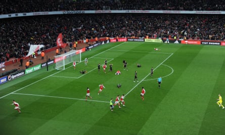 All 11 Arsenal players celebrate their 97th minute victory against Bournemouth.