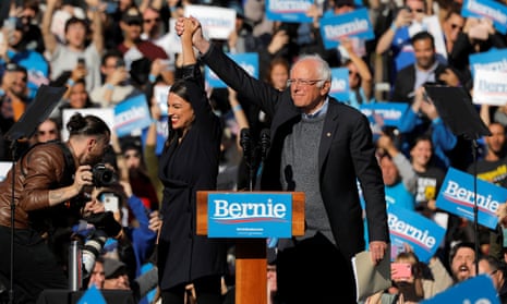 Alexandria Ocasio-Cortez introduces Bernie Sanders at Queensbridge Park in New York City.