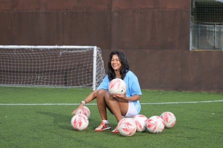 Poppy at the training ground with a football