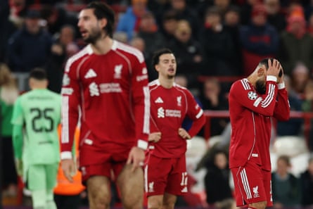 Mohamed Salah (right) reacts after Liverpool concede a fourth goal against PSV Eindhoven in the Champions League