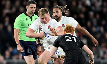 Fin Baxter charges forward during the first Test between the All Blacks and England in Dunedin.