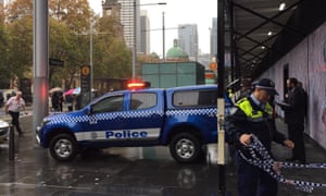 Police block off an entrance to Town Hall station in Sydney