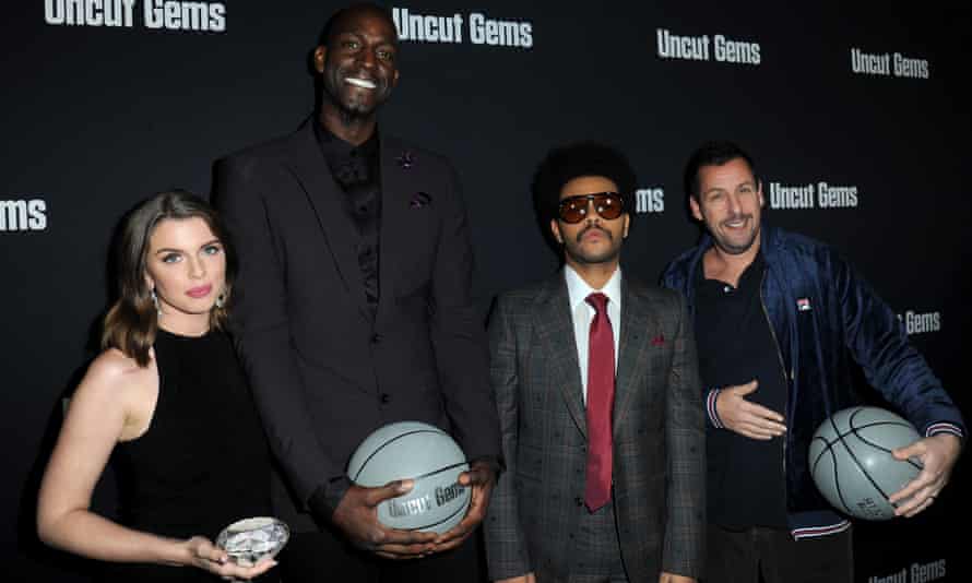From dominatrix to debutante: who is the real Julia Fox? Julia Fox with Kevin Garnett, The Weeknd and Adam Sandler at the Los Angeles premiere of Uncut Gems