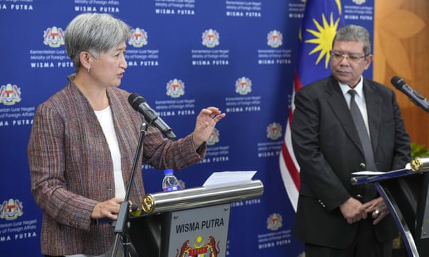 Australian foreign minister, Penny Wong, and Malaysia’s foreign minister, Saifuddin Abdullah, are standing next to each other at a press conference in Kuala Lumpur