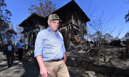 Scott Morrison inspects the bushfire affected area of Binna Burra, Queensland, in September 2019