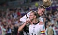 Germany's Alexandra Popp celebrates scoring their second goal with Jule Brand.
