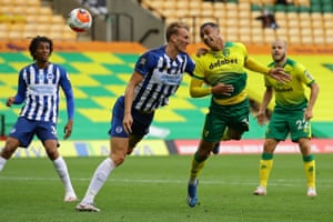 Norwich City’s Adam Idah headers the ball towards goal but hits the post.