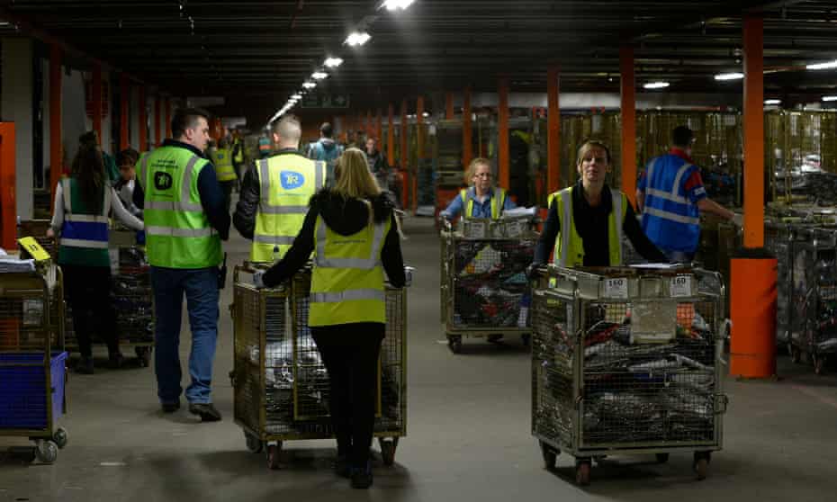 Workers at Sports Direct’s warehouse in Shirebrook, Derbyshire