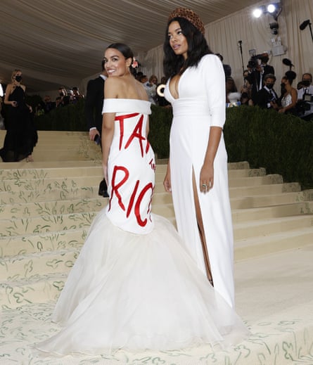Alexandria Ocasio-Cortez arrives withe Aurora James on the red carpet for the Met Gala at the Metropolitan Museum of Art on Monday in New York, New York.