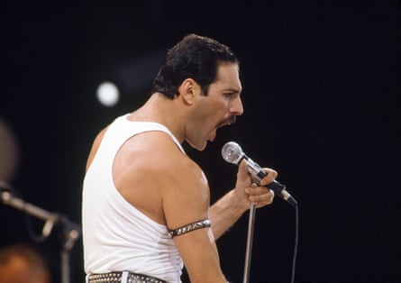 Freddie Mercury performing with Queen at Live Aid in 1985
