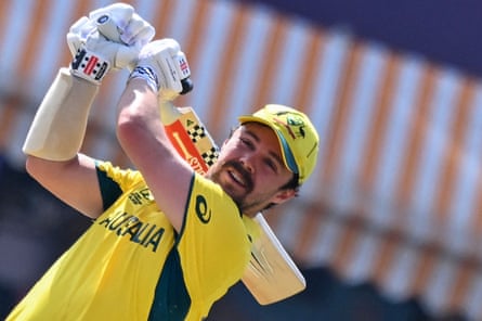 Travis Head tees off for Australia.