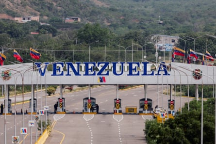 Empty drive-through border point with the word Venezuela prominently displayed above it.