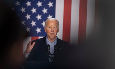 Biden in front of an American flag