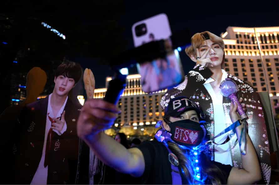 A BTS fan takes a selfie before a concert in Las Vegas.