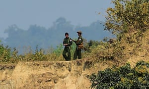 Myanmar soldiers patrol the Bangladesh border